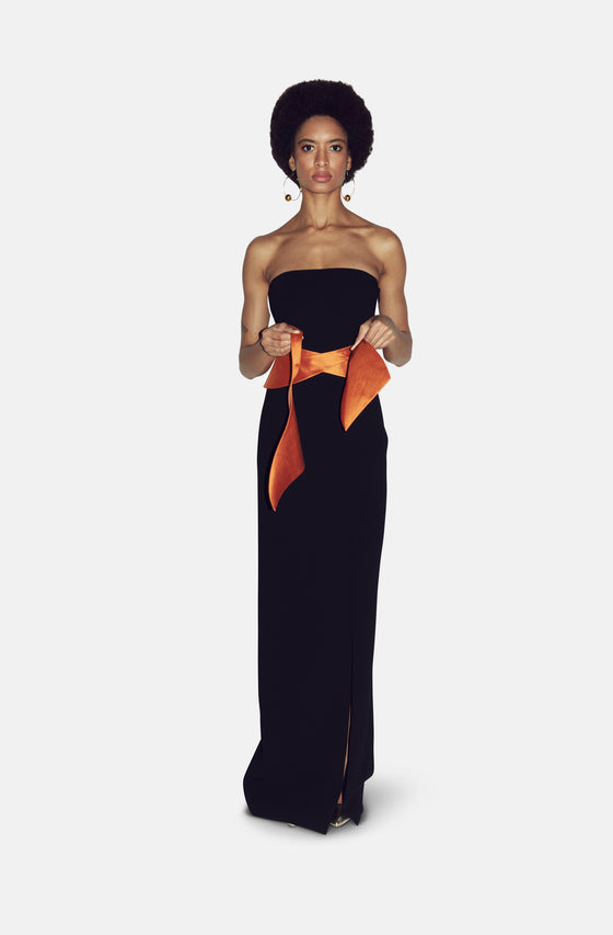 black dress with orange belt Black dress with orange scarf